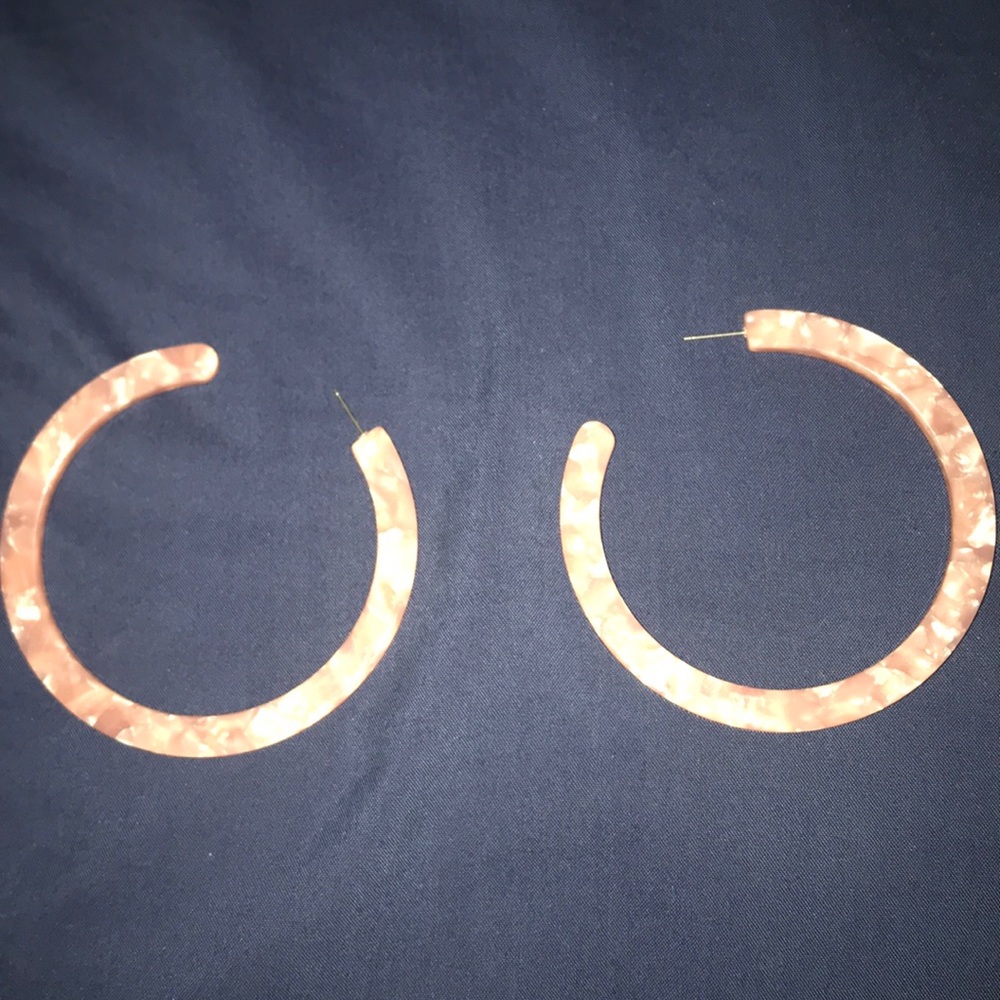 Light pink Express hoops.